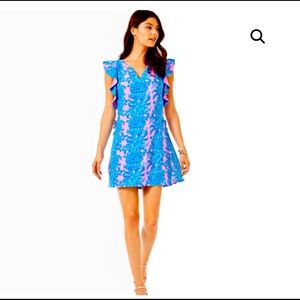 Shift romper with notched neckline.